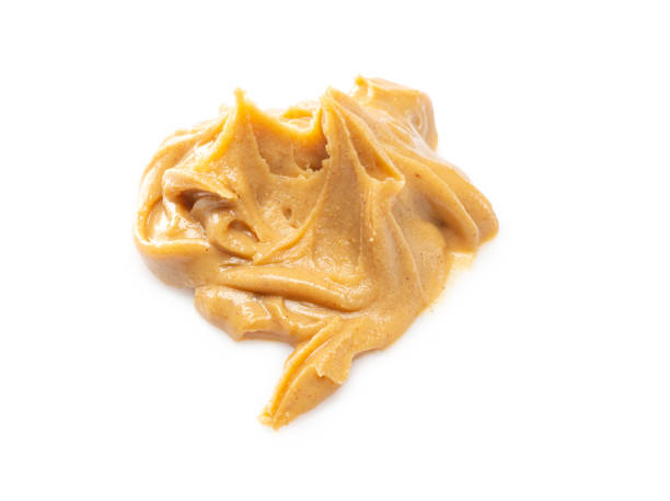 istock peanut butter isolated on white background 1225326626