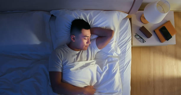 istock asian man sleep well 1225328450