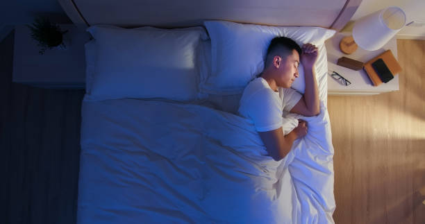 istock asian man sleep well 1225328553