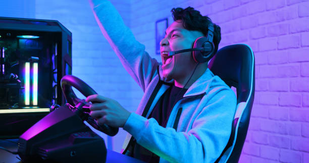 istock cybersport gamer play car racing 1225328892