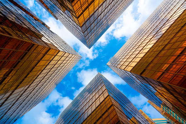 istock Modern buildings with gold and glass facades 1225328939