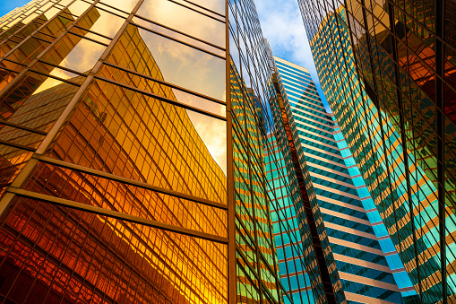 Modern buildings with gold and glass facades