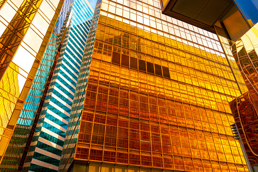 Modern buildings with gold and glass facades