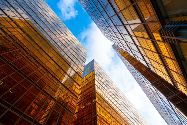 istock Modern buildings with gold and glass facades 1225329631