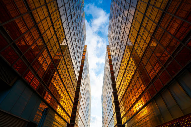 istock Modern buildings with gold and glass facades 1225329648