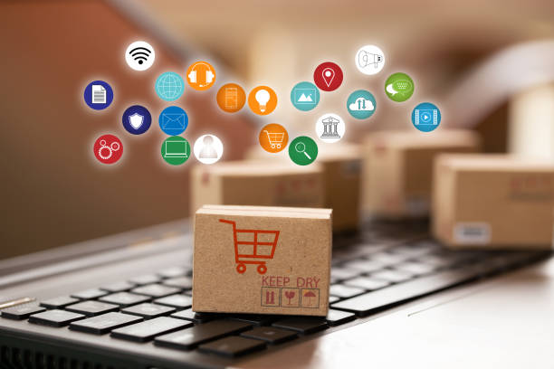 istock Cardboard box with icon on notebook keyboard. Online shopping, e-commerce and delivery service concept. Product service and delivery to consumers by connecting with the internet. 1225330212