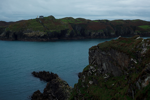 Atlantic ocean coastline. Cliffs on a shore in Ireland. toned