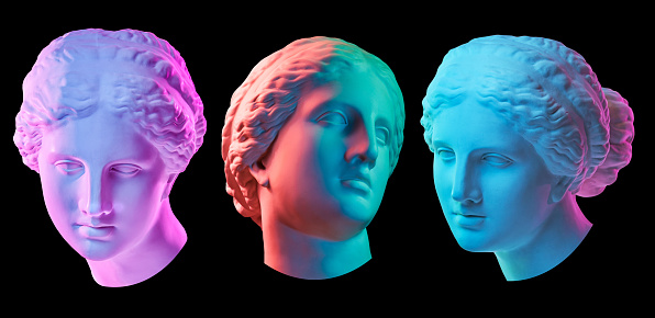 Statue of Venus de Milo. Creative concept colorful neon image with ancient greek sculpture Venus or Aphrodite head. Isolated on a black background. Webpunk, vaporwave and surreal art style.