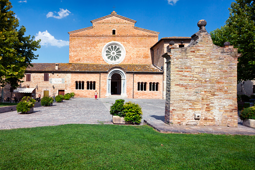 Tolentino, Macerata, Marche, Italy - Abbazia di Chiaravalle di Fiastra, West front of the abbey church. It is a Cistercian abbey situated between Tolentino and Urbisaglia