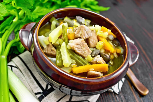 istock Soup Eintopf in clay bowl on dark board 1225333054