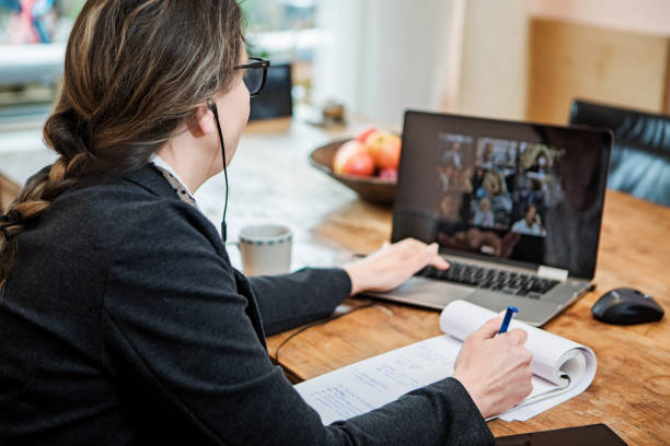 istock Businesswoman's Home Office Set Up for Webinar and Teleconference 1225334487