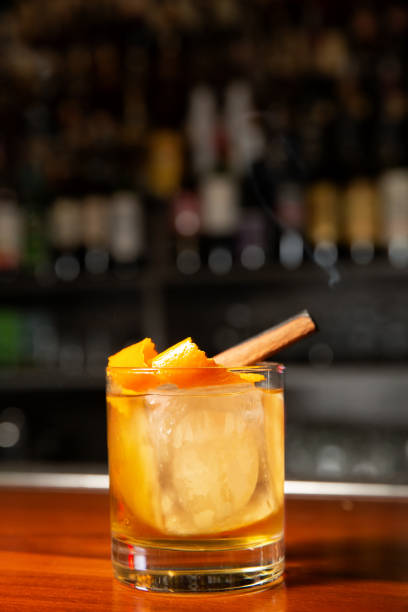 istock Orange cocktail with ice cube and orange zest 1225334574