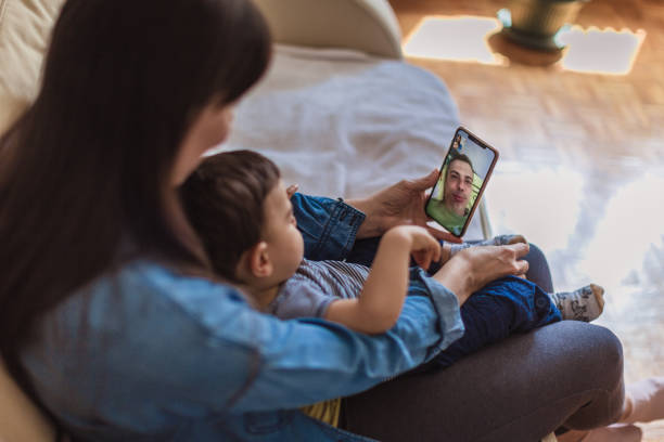 istock Family communicating via video call 1225334681
