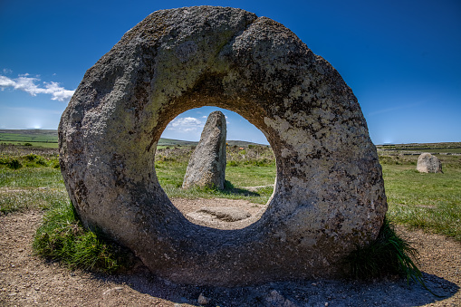 A view through the circular stone at Men an Tol on Bodmin moor