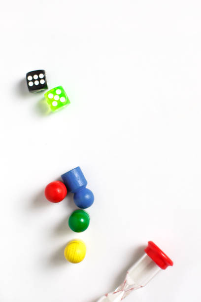 Game cubes, chips, hourglass on a white background. T