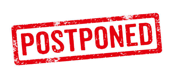 istock A red stamp on a white background - Postponed 1225339551