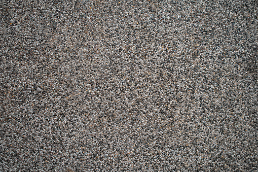 Little pebble stone floor texture background.