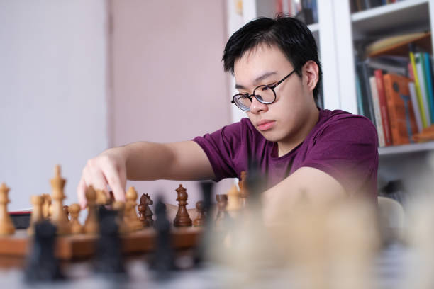 istock Teenager practising chess at home during Coronavirus isolation period 1225343490