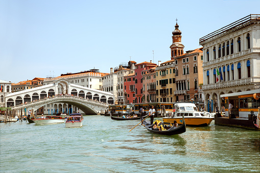 Venice, Italy - JUL 02, 2018: Grand canal  with the Rialto Bridge in sunny summer day