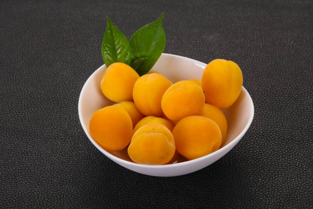 istock Ripe tasty sweet apricots heap 1225344983