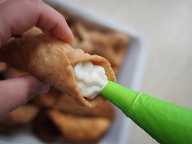 istock preparation of Sicilian cannoli 1225347049