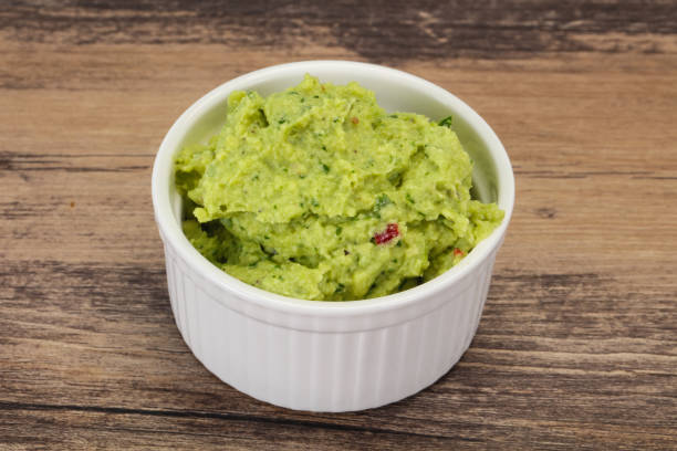 istock Avocado guacamole sauce with chili pepper 1225348664