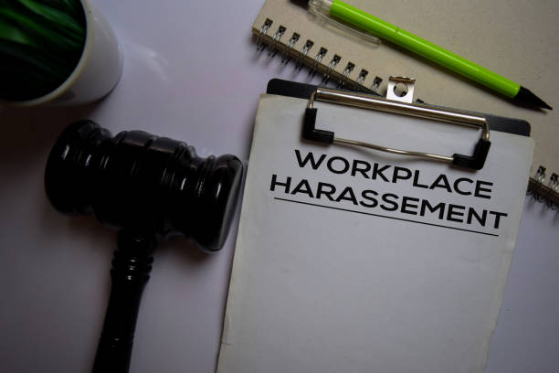 istock Workplace Harassement text on Document and gavel isolated on office desk. Law concept 1225349385