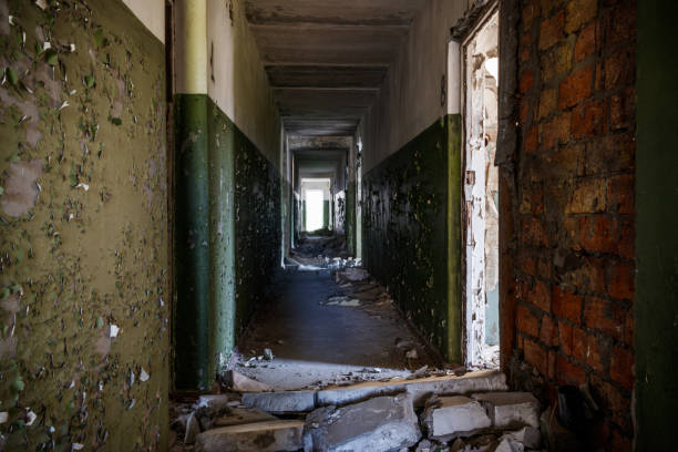 istock Long corridor of ruined abandoned house 1225351510