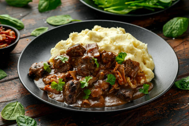 istock Fried Liver, bacon in onion gravy with mashed potato 1225355404