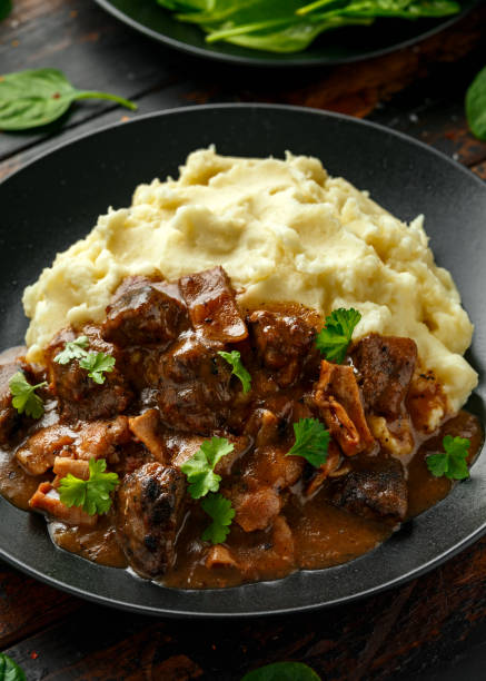 istock Fried Liver, bacon in onion gravy with mashed potato 1225355447