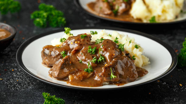 istock Fried Liver in gravy with mashed potato 1225355514