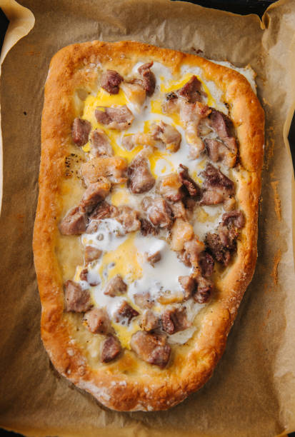 istock Traditional Macedonian Cuisine; pizza with cubed meat 1225356966