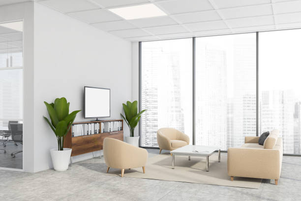 istock White and brown office waiting room corner with TV 1225359147