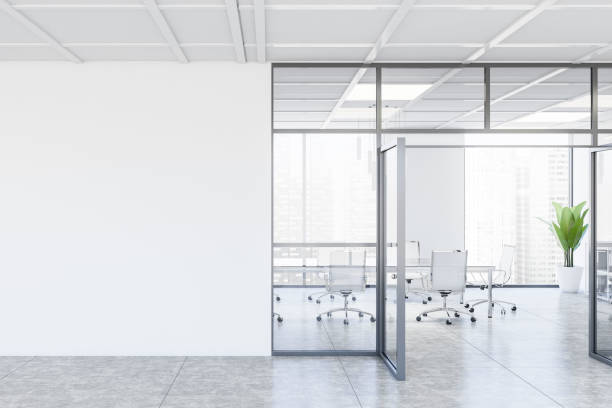 istock White conference room interior with mock up wall 1225360978