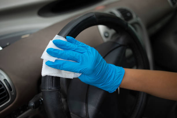 istock Cleaning car wit antibacterial wet wipes 1225362335