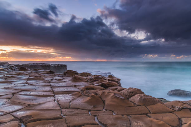 istock Rain Clouds and a Sunrise Seascape 1225362379