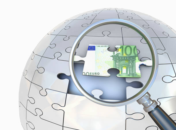 euro bill on puzzle piece - magnification coin equipment european union currency fotografías e imágenes de stock
