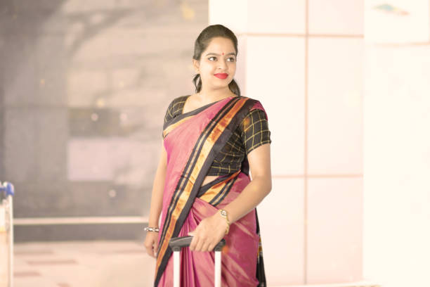 istock Indian Woman With Luggage 1225371971