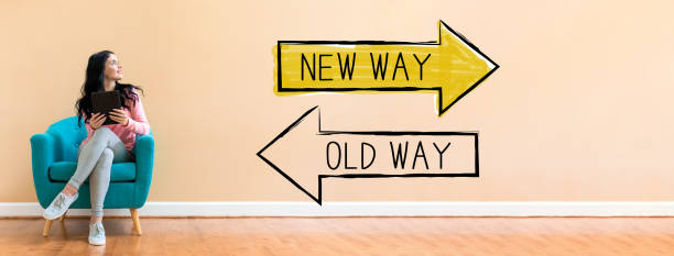 istock Old way or new way with woman using a tablet 1225375747