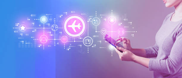 Airplane travel theme with woman using a tablet