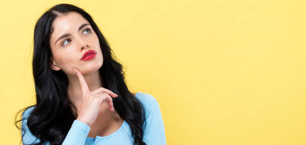 istock Young woman in a thoughtful pose 1225375763