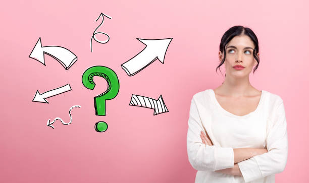 istock Question mark with arrows with young woman 1225375784