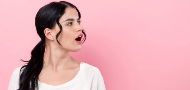 istock Young woman talking 1225375790