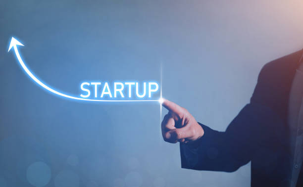 istock Businessman pointing arrow growing with STARTUP text. 1225376207