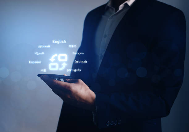 istock Hand tapping on translate button. Symbol of translation and top ten internet users languages.Translator  language course and e-learning concept. Translation: 