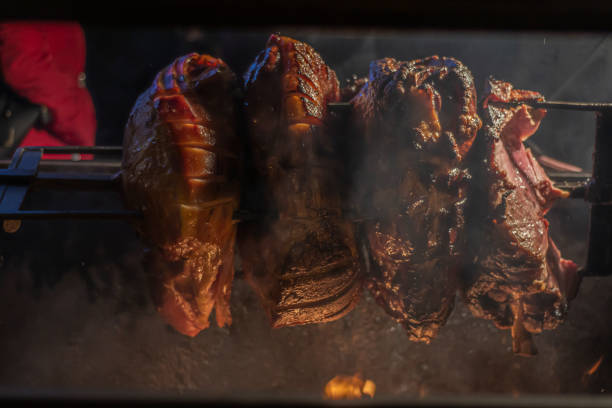 istock Large pieces of meat grilled on a spit. 1225377297
