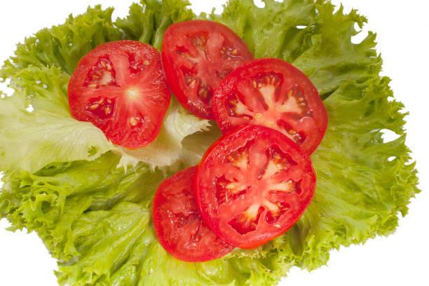 istock tasty red tomatoes and lettuce on the table 1225380311