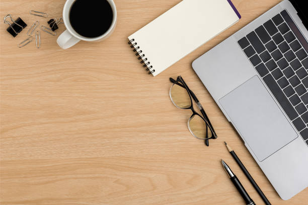 istock Top view Wood office desk table. Flat lay Workspace 1225380429