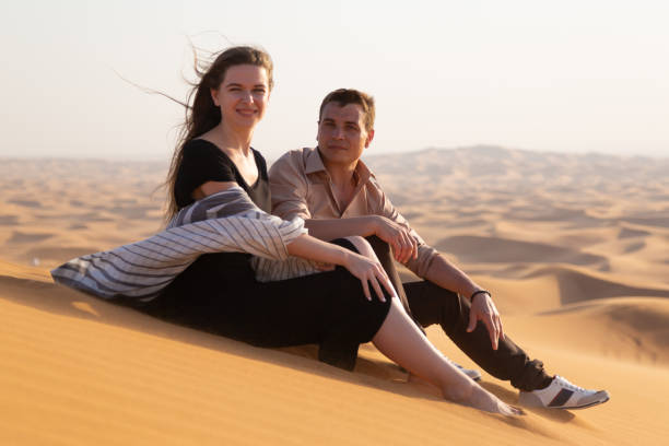 istock Newlyweds on a honeymoon in the desert. 1225380547
