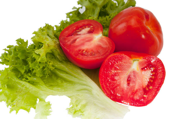 istock tasty red tomatoes and lettuce on the table 1225380812
